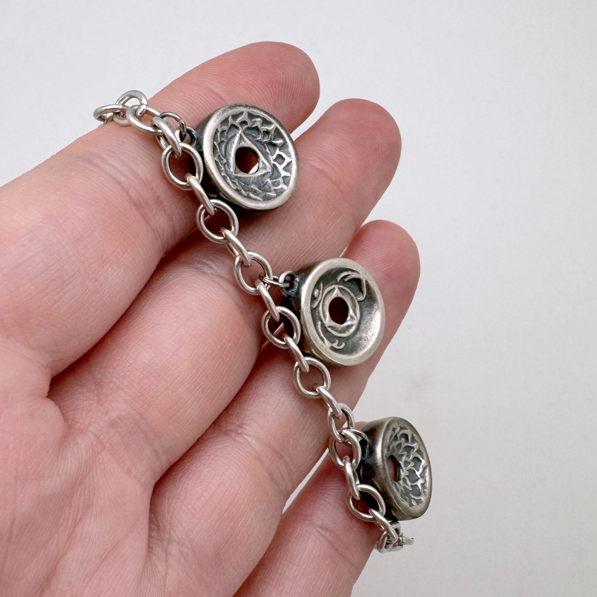Seven chakra charm bracelet in handmade sterling silver, 7.5 inches